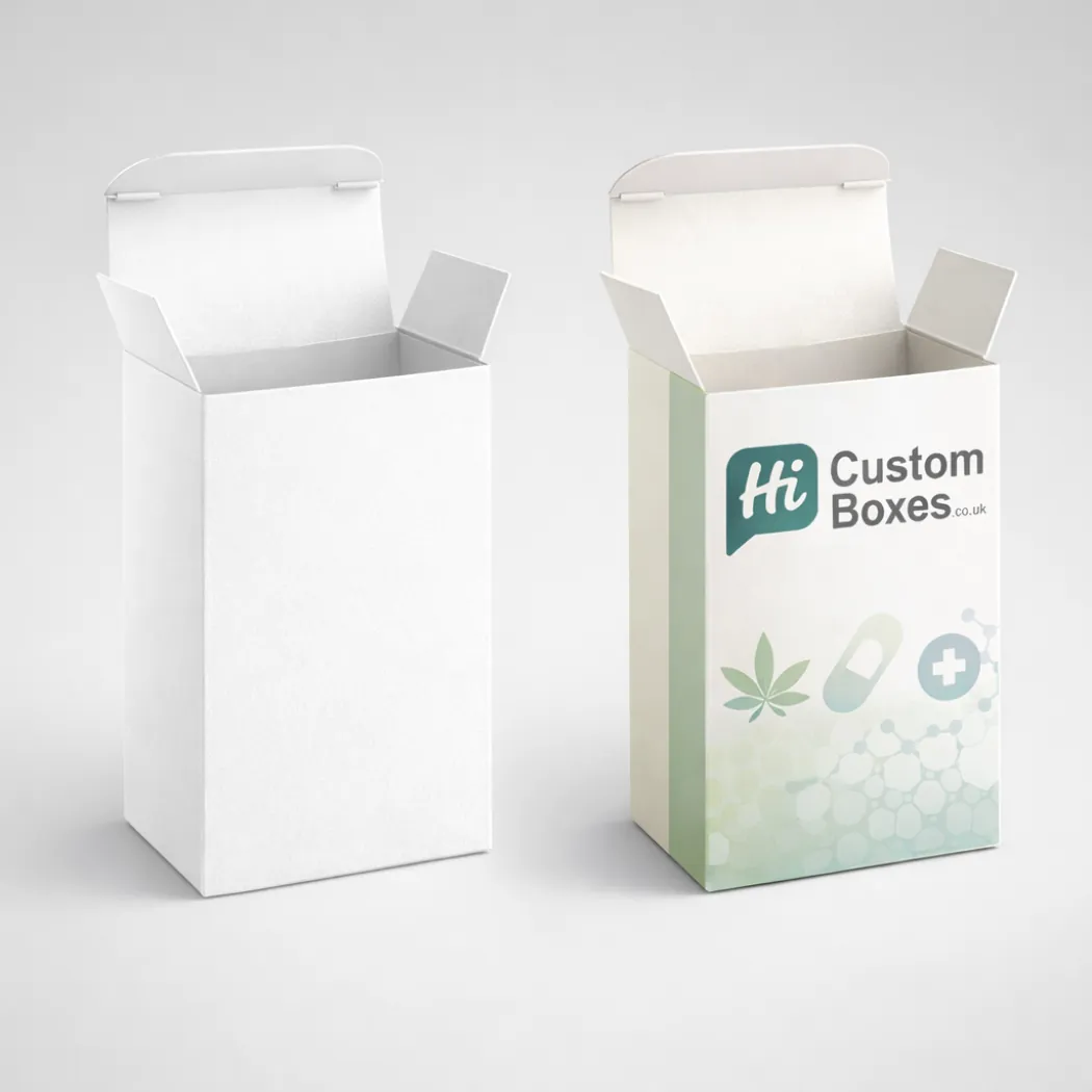 Two small cube-shaped cardboard boxes- one plain white and one with a green leaf design-